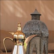 Picture Of Arabic Coffee In A Traditional Dallah With Dates