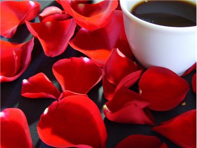 Picture Of Rose Petals And Cup Of Coffee